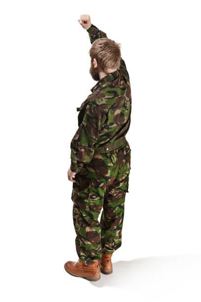 istock Young army soldier wearing camouflage uniform isolated on white 951154950