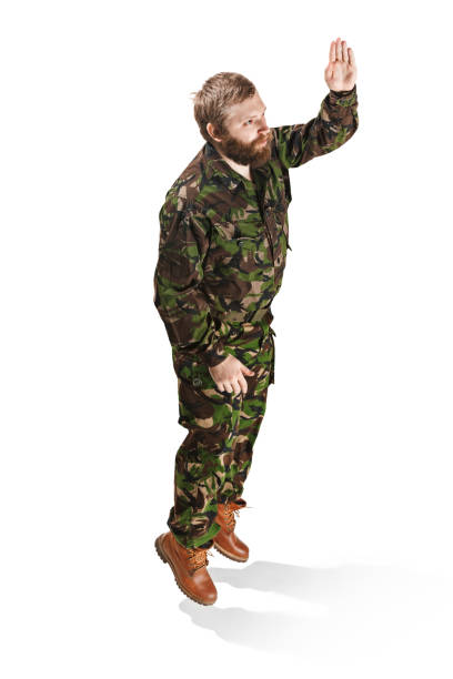 istock Young army soldier wearing camouflage uniform isolated on white 951158200