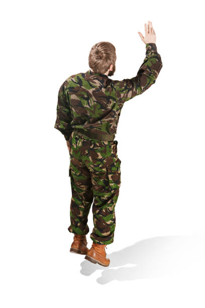 istock Young army soldier wearing camouflage uniform isolated on white 951158332
