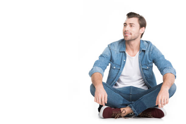 istock handsome smiling man in denim, isolated on white 951164638