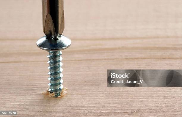 Screw Screwdriver In Wood Stock Photo - Download Image Now - Screw, Screwdriver, Wood - Material