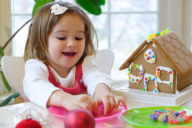 A young brunette female enjoying Christmas activities stock photo