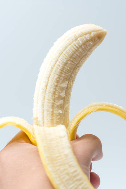 istock Human Hand Holding Banana Fruit Nutrition Concept 951177778