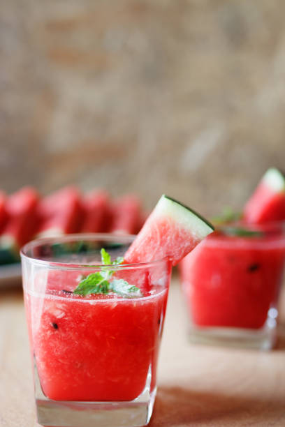 istock Watermelon drink on wooden background. 951178546