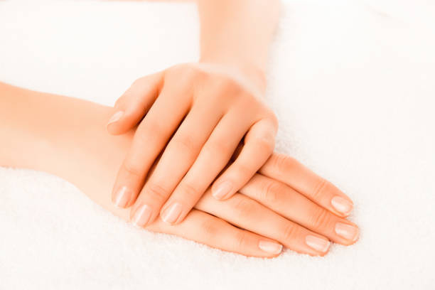 istock Woman's hands with beautiful manicure isolated on white background 951189910