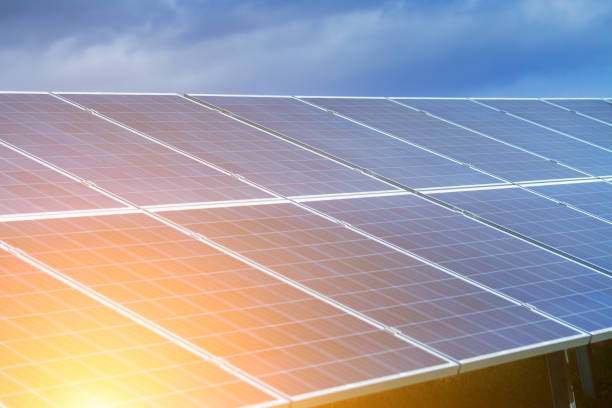 istock Solar panels, photovoltaic, alternative source environmentally friendly energy. In the backlight sunbeam light. 951193070