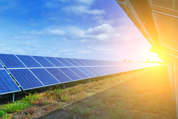 istock Solar panels, alternative source environmentally friendly energy. In the backlight sunbeam light. 951193186