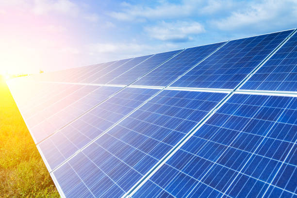 istock Solar panels, alternative source environmentally friendly energy. In the backlight sunbeam light. 951193202