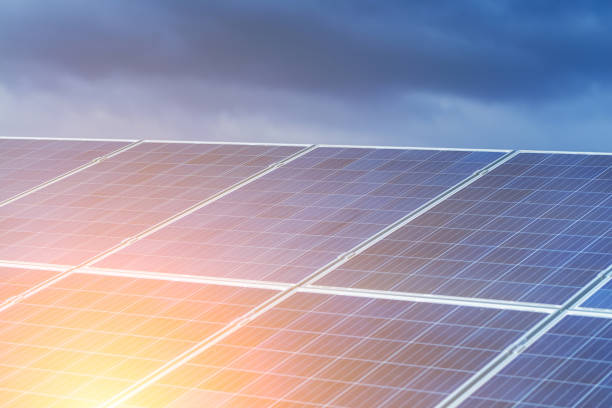 istock Solar panels, alternative source environmentally friendly energy. In the backlight sunbeam light. 951193240