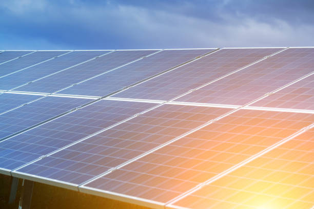 istock Solar panels, alternative source environmentally friendly energy. In the backlight sunbeam light. 951193242