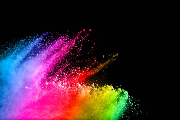 istock Multi color powder explosion isolated on black background. Colored dust splash cloud on black background. Launched colorful particles on background. Painted Holi. 951205344