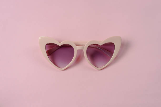 istock Pink heart shape sunglasses isolated 951205906