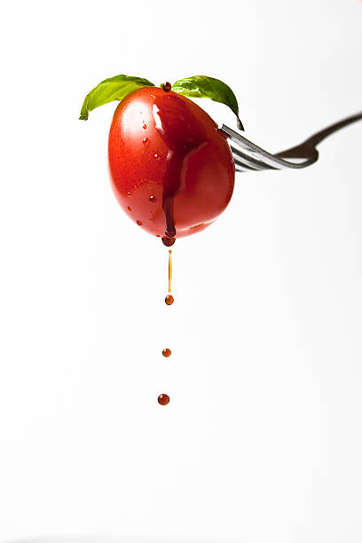 Cherry-Tomaten auf eine Gabel. – Foto
