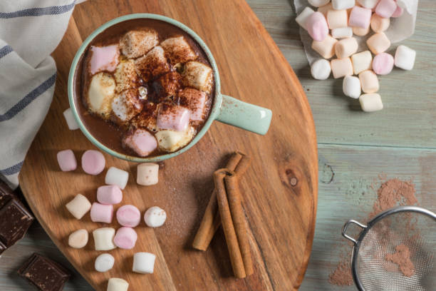 istock Winter hot drink. Hot chocolate or cocoa with marshmallow and spices 951229268