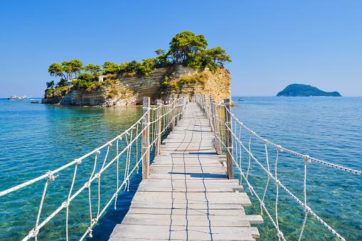 Wooden bridge to the island Cameo, Zakynthos, Greece.