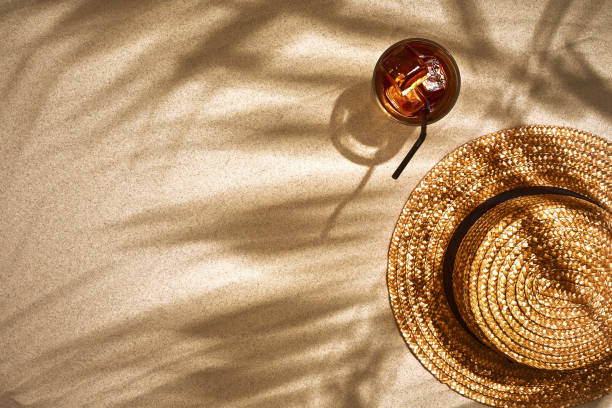 istock Top view of summer accessories on sandy beach 951241014