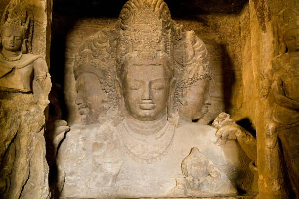 istock Three-headed god Shiva statue at Elephanta Caves 951242220