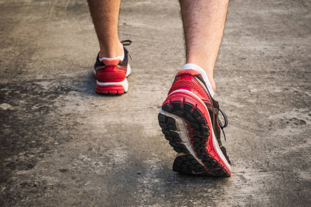 istock Male runner walking on the road 951245530