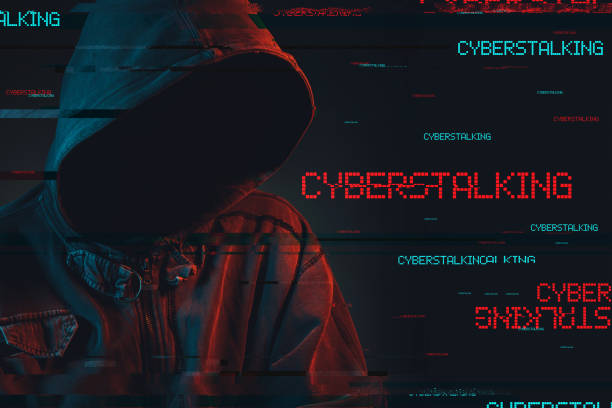 Cyberstalking concept Cyberstalking concept with faceless hooded male person, low key red and blue lit image and digital glitch effect stalker stock pictures, royalty-free photos & images