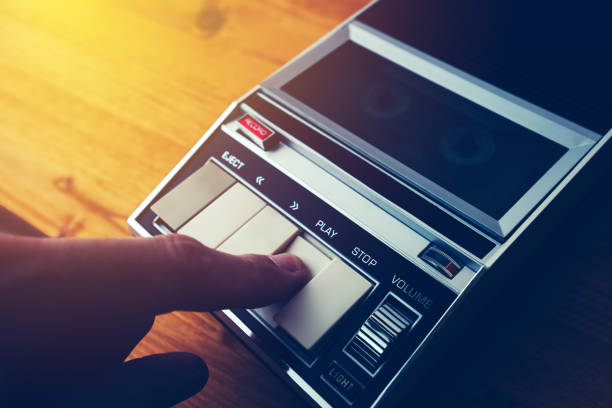 istock Playing audio cassette in vintage player 951257450
