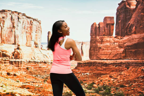 istock Attractive female standing out in the desert 951258020
