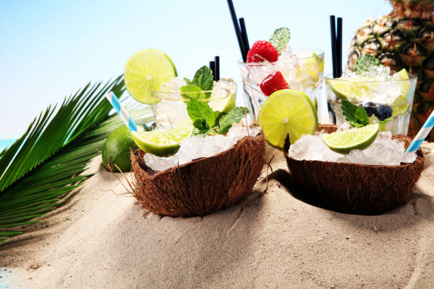 istock Different types of mojito cocktail on the beach. 951265044