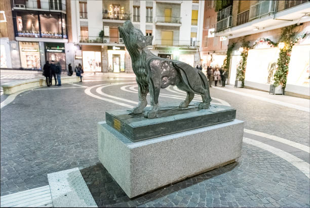 COSENZA, ITALY - DECEMBER 28: Sila's Wolf, a sculpture by Mimmo Rotella, is a public monument on the main street of Cosenza, Italy, December 28, 2016