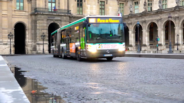 Transport traffic on square Place du Carrousel near Louvre museum toward Royal Palace