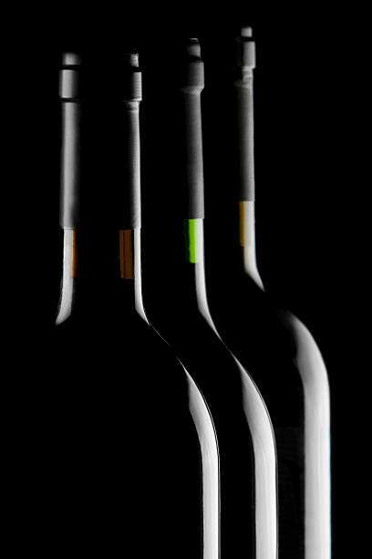 Bottles of wine in a row stock photo