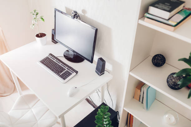 istock Work from home. Workspace of a freelancer. Interior. Modern design with white furniture and technologies. 951298328