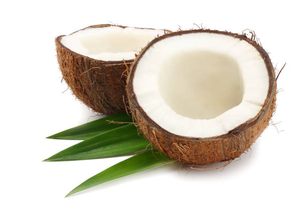 istock Coconut with green leaves isolated on white background 951299148