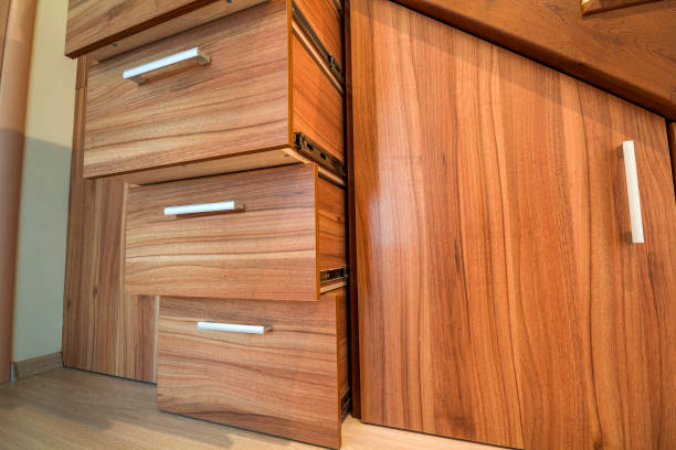 istock Modern architecture interior with luxury hallway with glossy wooden stairs in modern storey house. Custom built pullout cabinets on glides in slots under stairs 951299156