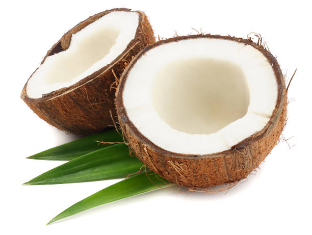 istock Coconut with green leaves isolated on white background 951299180