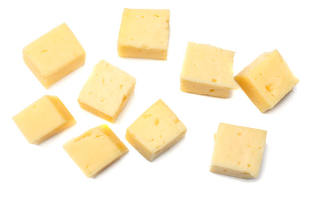 istock piece of cheese isolated on white background. top view 951299222