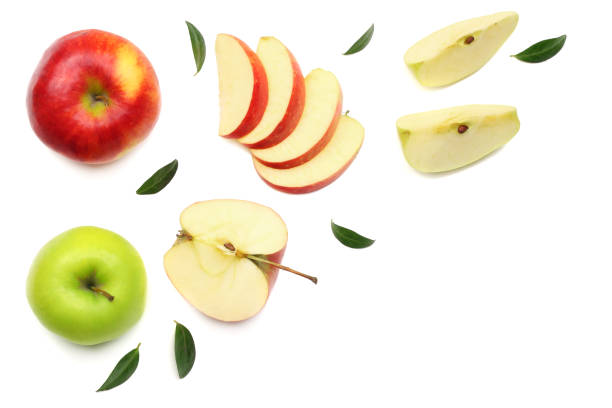 istock green and red apples with slices isolated on white background. top view 951299270