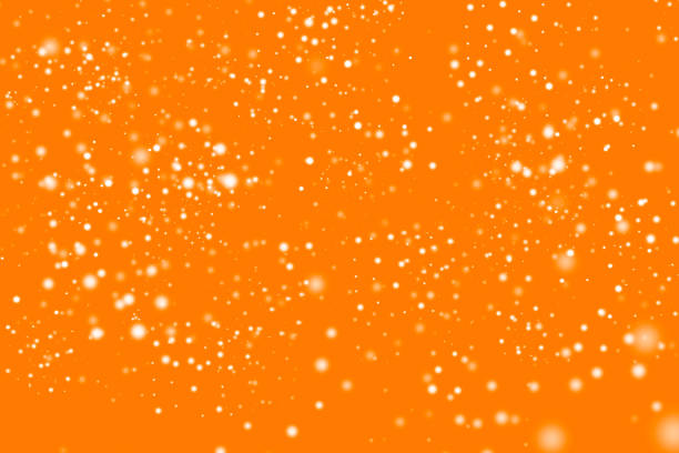 istock Golden abstract glitter orange background with blinking white irregular spots. Blurred Bokeh. Glamour texture. 951299664