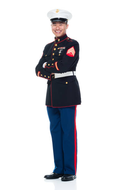 istock US Marine in uniform with arms crossed 951321440