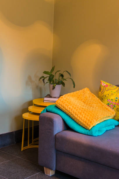 istock Colorful interior with sofa pillows and blankets 951321572