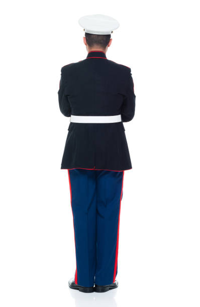 istock US Marine in uniform with arms crossed 951321590