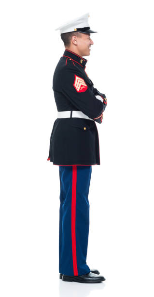 istock US Marine in uniform with arms crossed 951321602