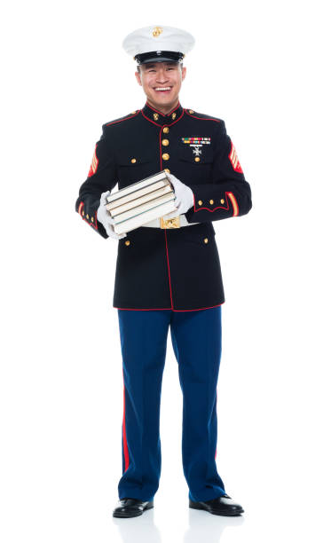istock US Marine in uniform holding books 951321616