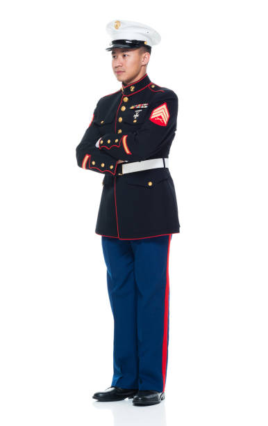 istock US Marine in uniform with arms crossed 951321788