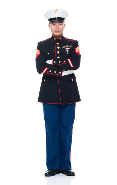 istock US Marine in uniform with arms crossed 951322004
