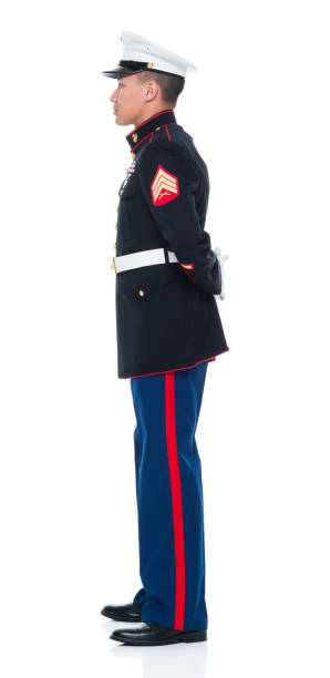istock US Marine in uniform with arms behind 951322266