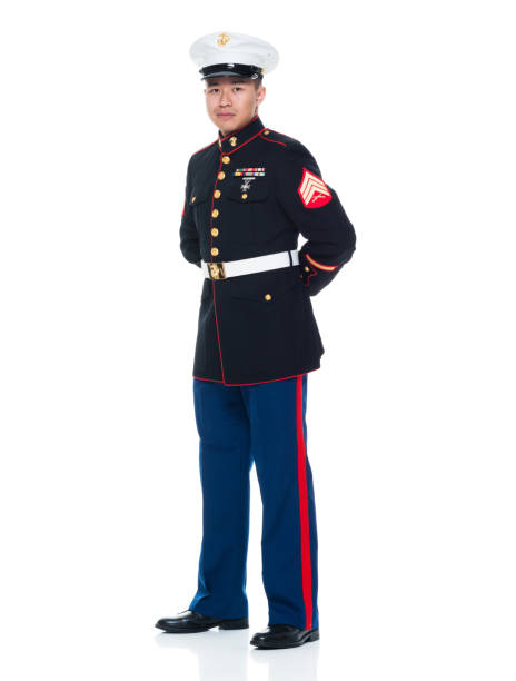 istock US Marine in uniform with arms behind 951322298