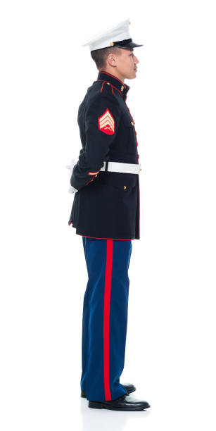 istock US Marine in uniform with arms behind 951322462
