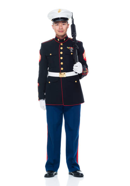 istock US Marine in uniform holding rifle 951322494