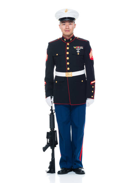 istock US Marine in uniform holding rifle 951322514
