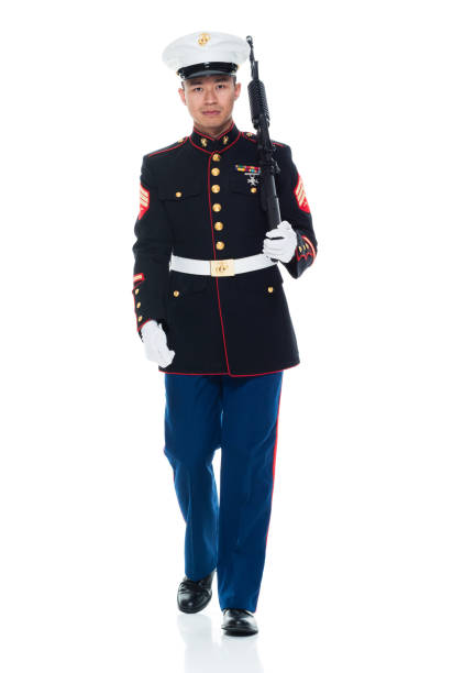 istock US Marine in uniform holding rifle 951322650