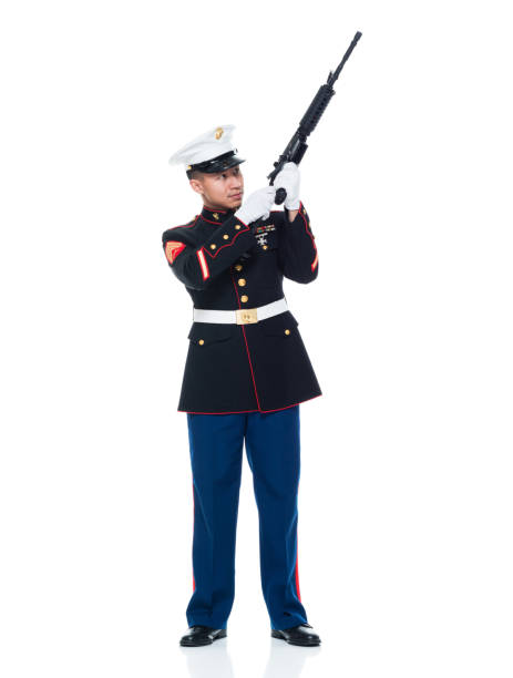 istock US Marine in uniform holding rifle 951322710